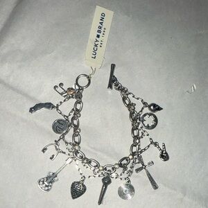 NWT Retired Lucky Brand Rock-N-Roll Silver Tone Charm Bracelet OS Music Lovers